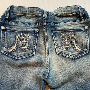 Rock & Republic amped image blue wide leg, jeweled pocket denim.  Women’s 25